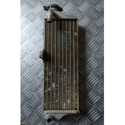 Radiateur coté bouchon 125...